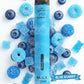 Blue vape pen with black accents on a white background